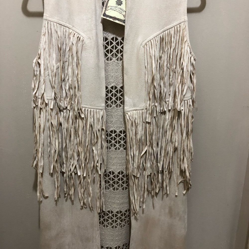 Paparazzi.Long faux suede Fringed vest